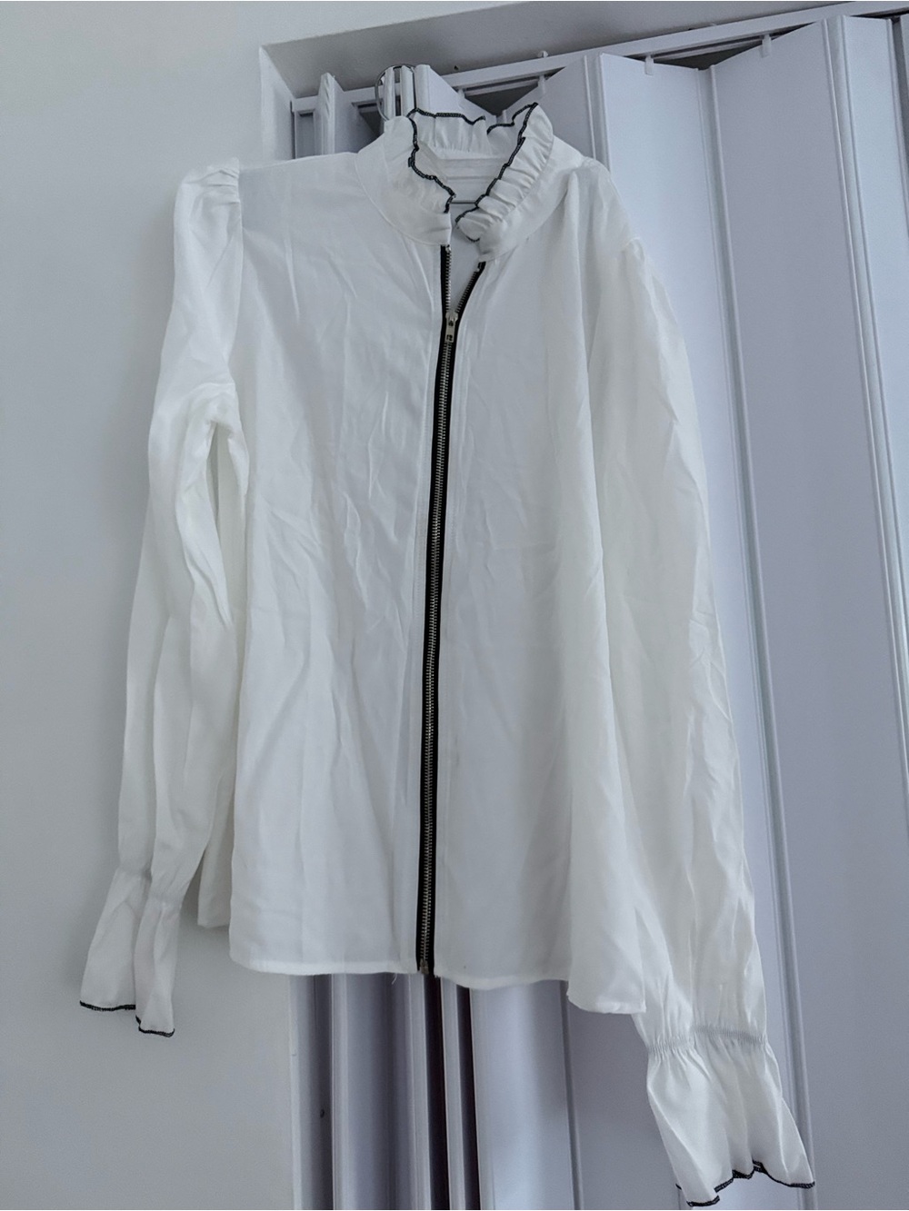White Ruffle-Trim Bomber  style blouse with Contrast Zip